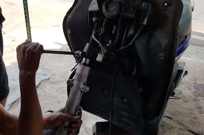 servis shock depan