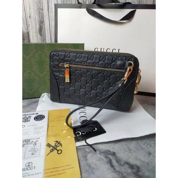 CLUTCH BAG TAS TANGAN PRIA GUCCI LEATHER EMBOSS GG