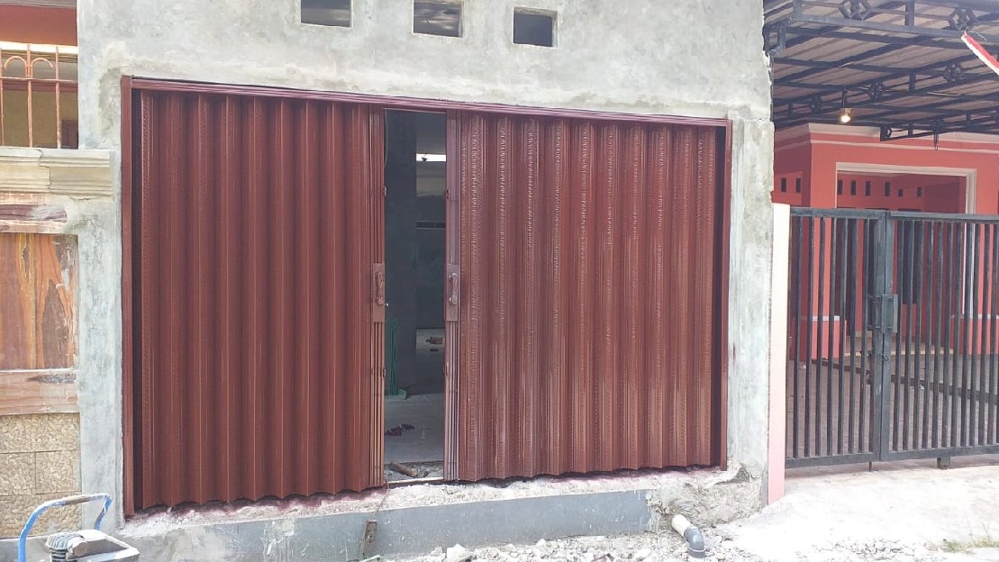 081310150492 bongkar pasang folding gate pondok gede kebun raya Bogor kebon pala Halim kebon nanas 