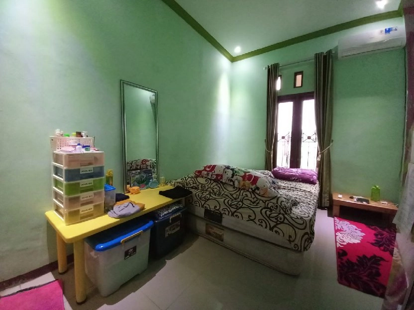 Dijual Rumah Siap Huni + Ruangan Toko di Ratna Jatibening/Jatikramat Pondok Gede Bekasi