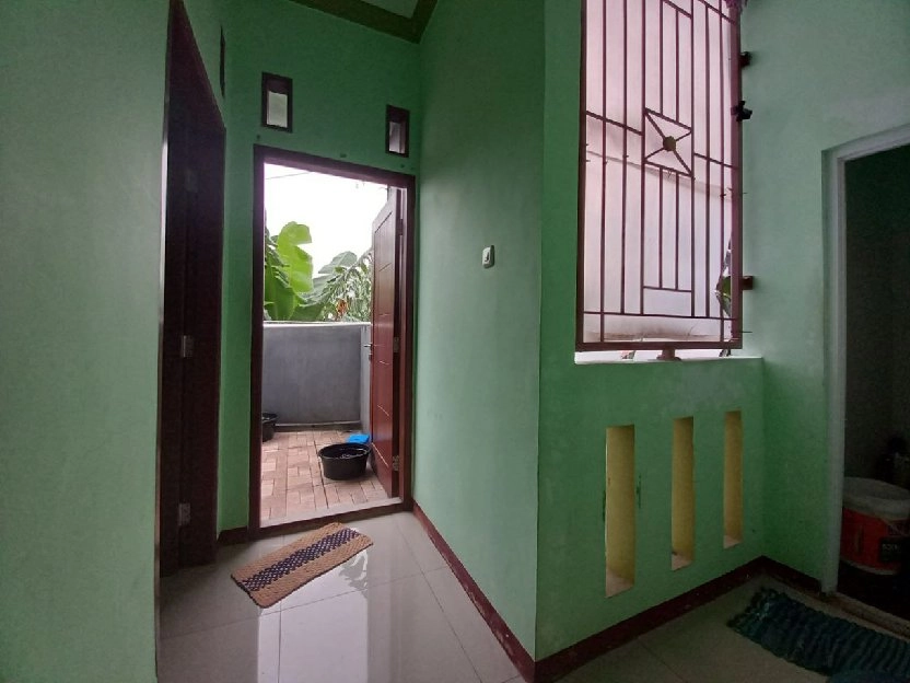 Dijual Rumah Siap Huni + Ruangan Toko di Ratna Jatibening/Jatikramat Pondok Gede Bekasi