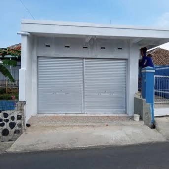 tukang service pintu rolling door murah panggilan 085774184638