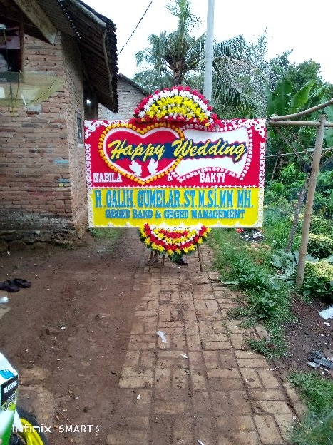 karangan bunga papan