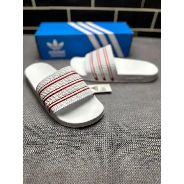 Sandal selop slip on pria adidas