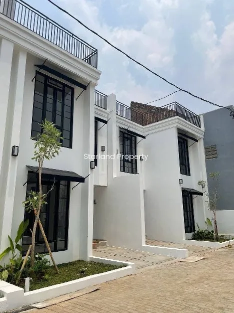 rumah modern siap huni plus rooftop di Rempoa 