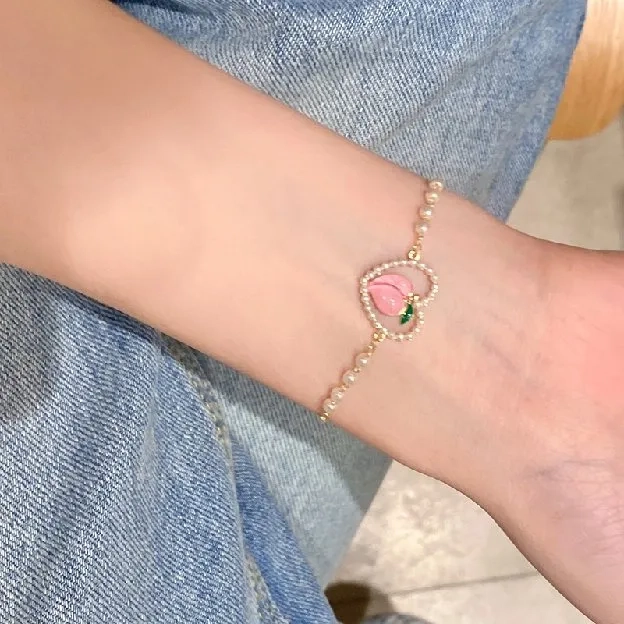 Peachy Asthoret Gelang Rantai Mutiara Bentuk Hati Model Hollow Warna Pink Peach Untuk Wanita Mutiara