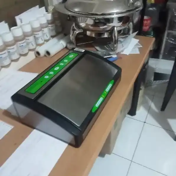 Cuci gudang NEW GETRA Vacuum packaging machine ET-2500 Garansi