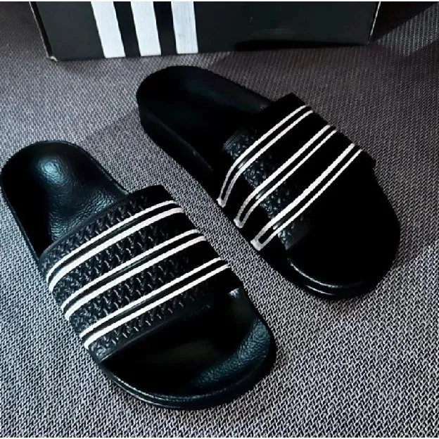 Sandal selop slip on pria adidas