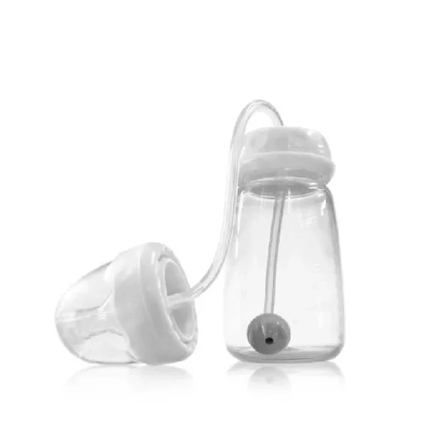 Hands free feeding bottle. Botol susu bayi bebas genggam