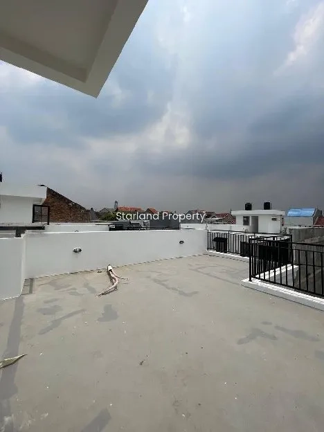 rumah modern siap huni plus rooftop di Rempoa 