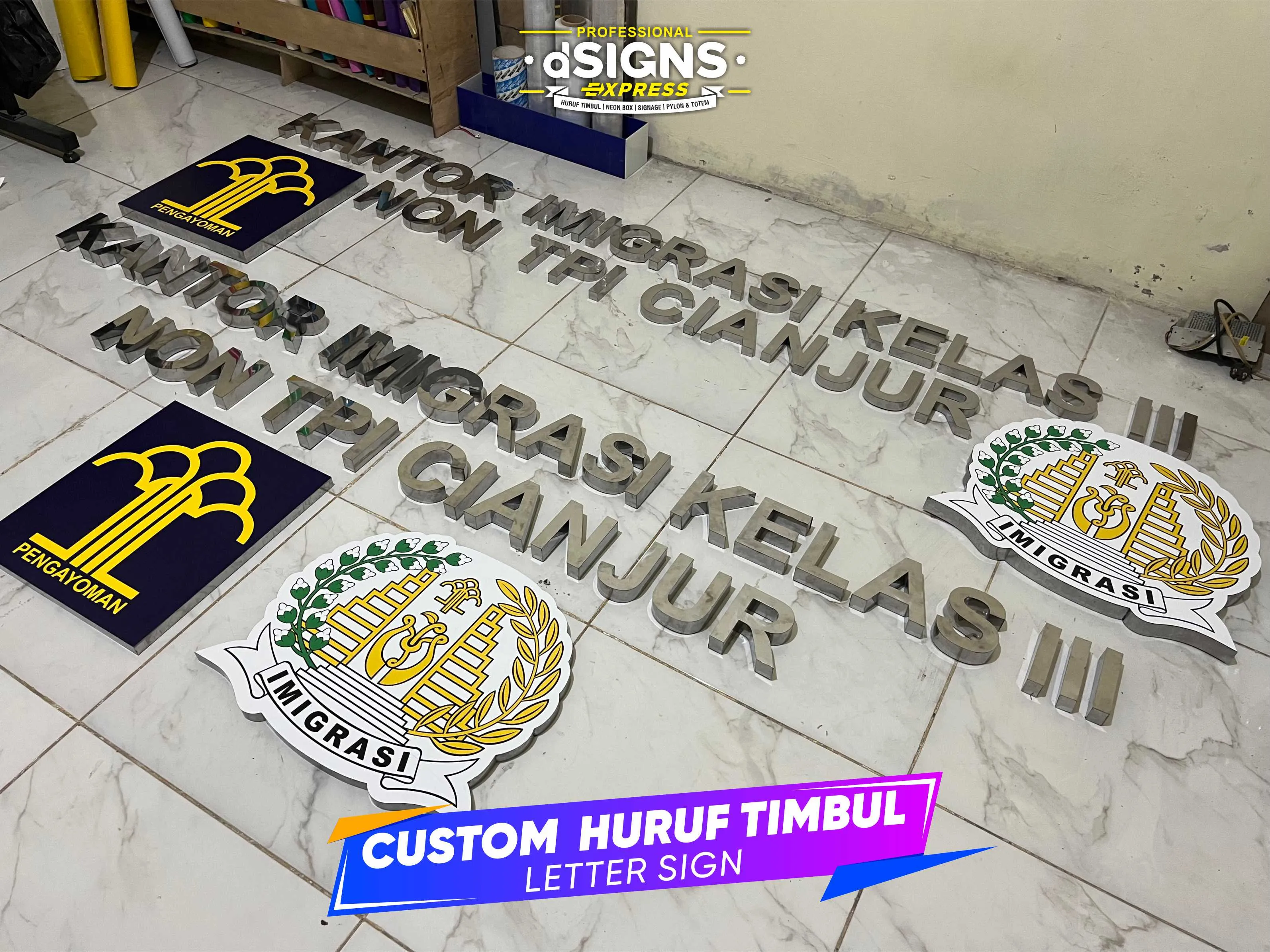 Pemasangan Huruf Timbul Stainless Steel
