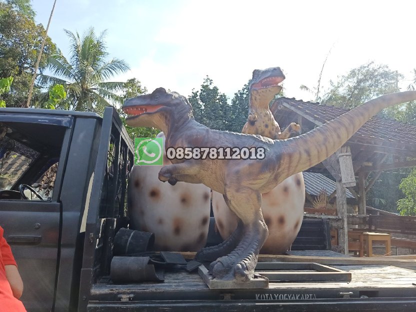 Patung Anak Dinosaurus